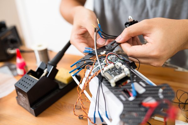 How to ensure a UK business complies with the legal requirements for operating drones for delivery services?