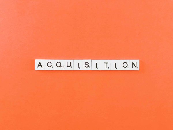 What are the essential legal checks before purchasing a competitor in the UK?